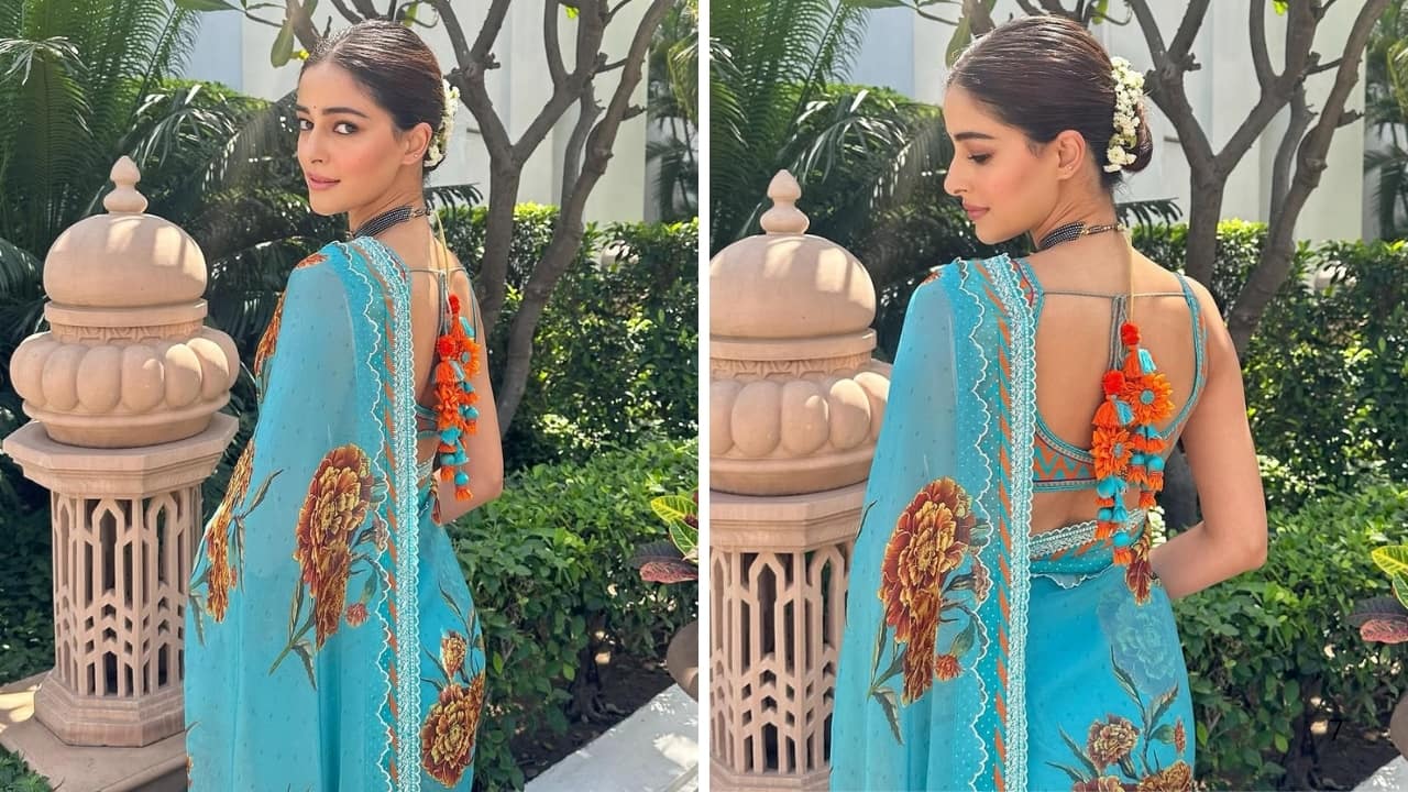 Ananya Panday paired her saree with an orange floral blouse with aqua blue lace detailing (Images; @ananyapanday/Instagram)
