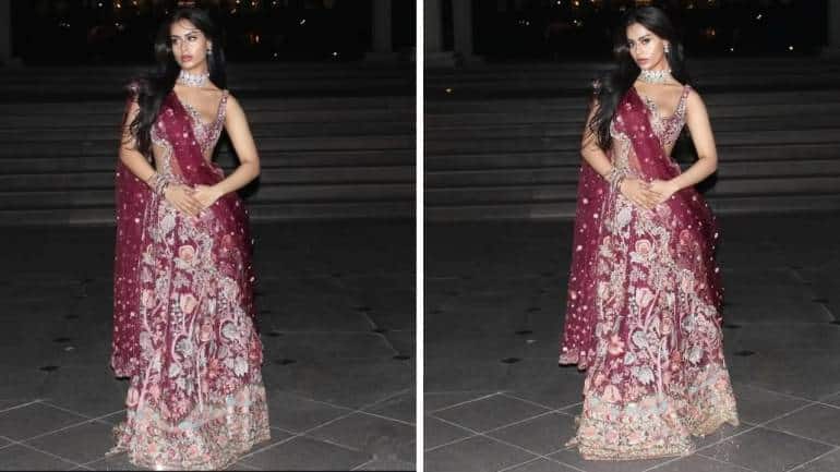 Nysa Devgn wore a wine-coloured lehenga, hand-embroidered with pastel pink, sage green, and metallic gold (Images; @rahulmishra_7/Intagram)