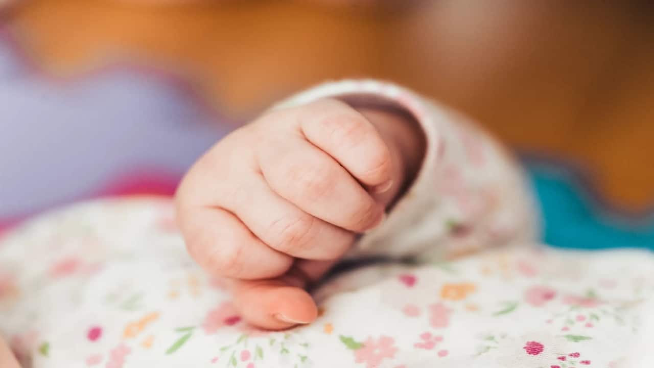 Unaware of pregnancy, woman with stomachache goes to hospital, gives birth to boy: 'Shocked'