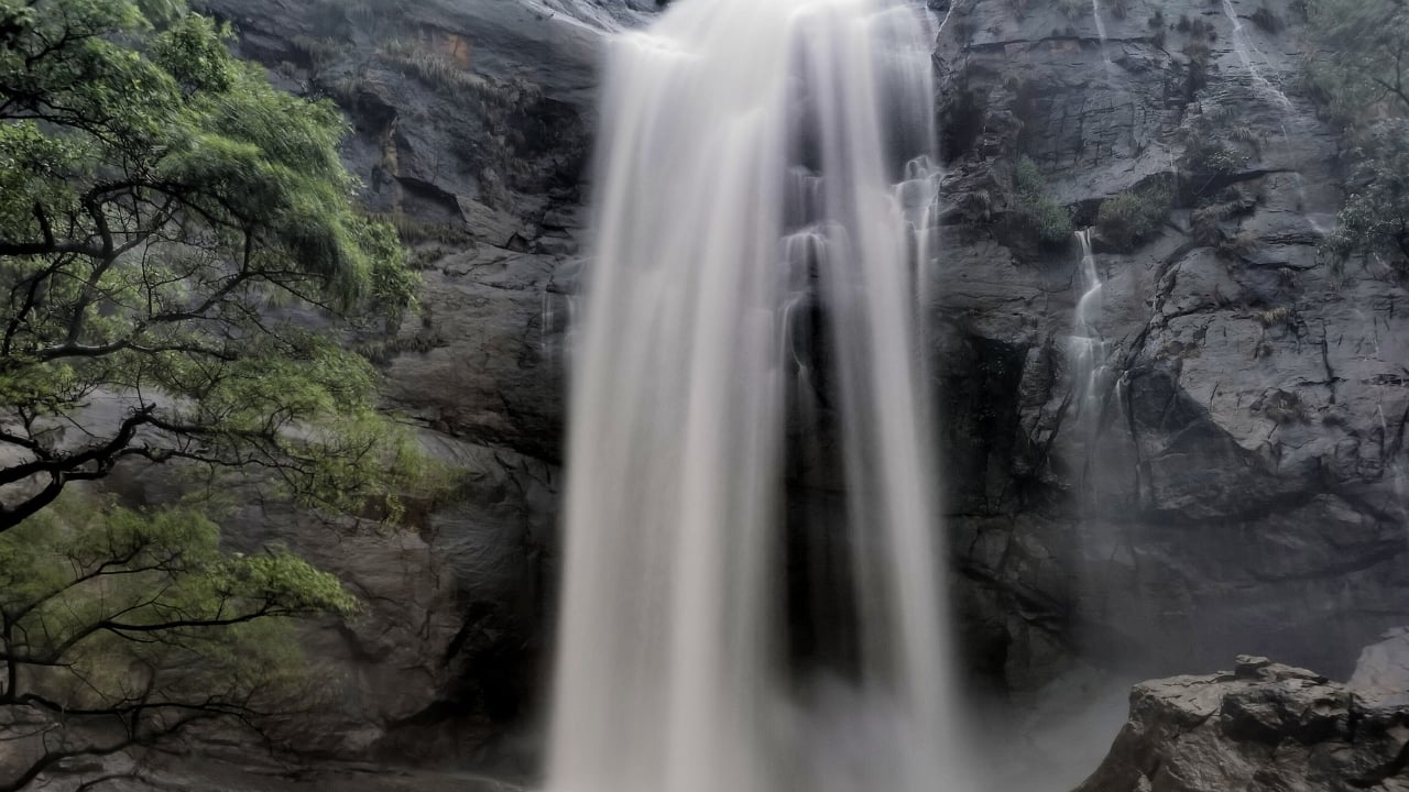 7. Kolli Hills, Tamil Nadu Kolli Hills, known for its 70 hairpin bends, is a thrilling drive. It is rich in medicinal plants and offers a blend of mythology and nature with sites like the Arapaleeswarar Temple and Agaya Gangai Waterfalls. (Image: Canva)