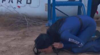 Katy Perry kisses earth