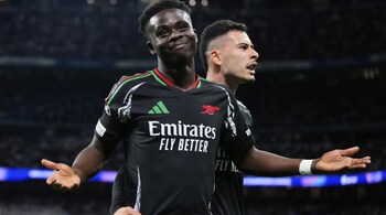 Bukayo Saka celebrates after scoring the first goal of Arsenal