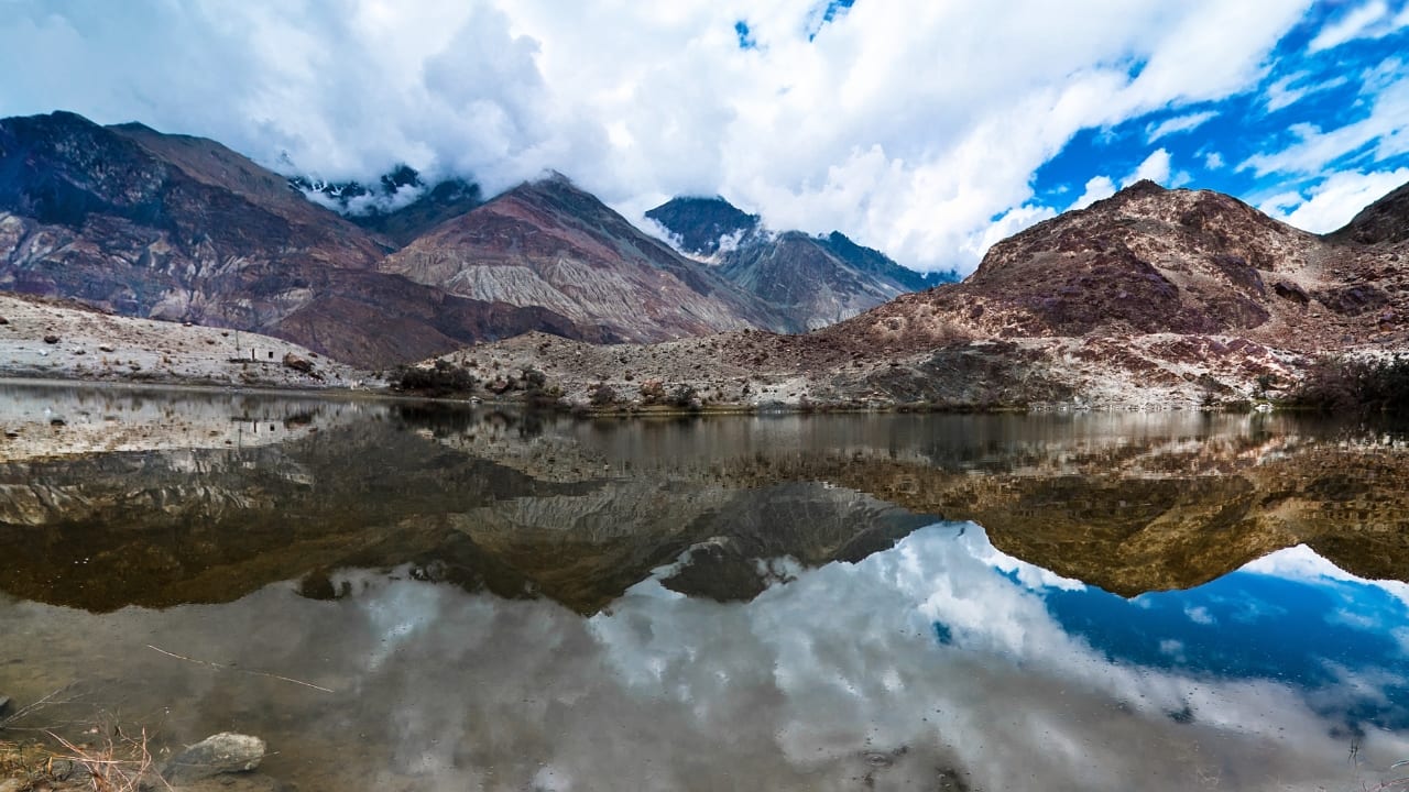 3. Yarab Tso – The Hidden Lake of Nubra Forget crowded lake shores—Yarab Tso is a sacred, serene lake near Sumur village that barely makes it to maps. A short uphill hike rewards you with solitude and magic in equal parts. (Image: Canva) 3. Yarab Tso – The Hidden Lake of Nubra Forget crowded lake shores—Yarab Tso is a sacred, serene lake near Sumur village that barely makes it to maps. A short uphill hike rewards you with solitude and magic in equal parts. (Image: Canva)