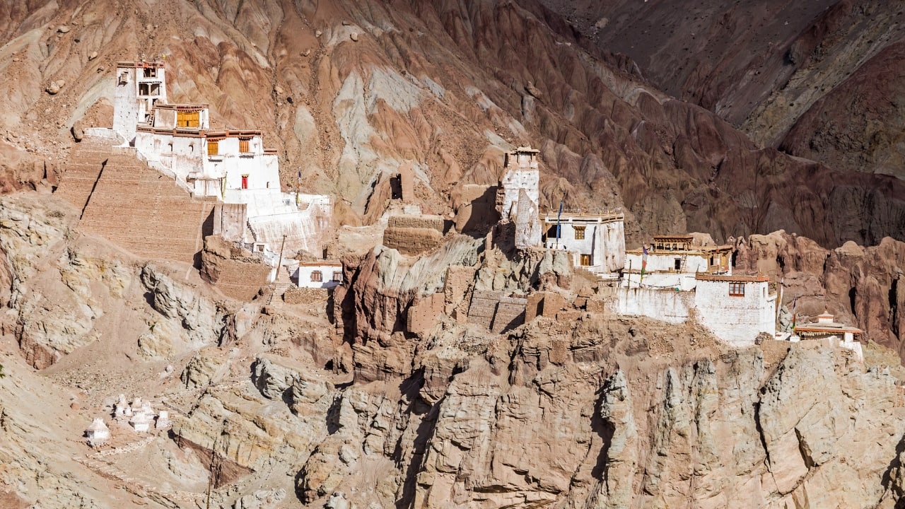 8. Basgo Monastery – Ruins That Whisper Stories Often overlooked on the Leh-Kargil route, Basgo is where crumbling mud walls meet majestic murals. It's ancient, cinematic, and oozes a kind of haunted beauty you won’t forget. (Image: Canva) 8. Basgo Monastery – Ruins That Whisper Stories Often overlooked on the Leh-Kargil route, Basgo is where crumbling mud walls meet majestic murals. It's ancient, cinematic, and oozes a kind of haunted beauty you won’t forget. (Image: Canva)