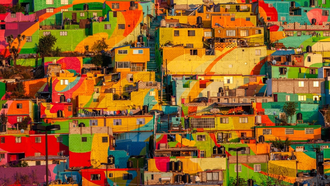 1. Las Palmitas, Pachuca, Mexico Tucked away in Pachuca, Las Palmitas is a neighborhood where color isn’t just an afterthought—it’s the very heart of the place. Thanks to over 200 stunning murals that cover the hillside, this area has gone from ordinary to extraordinary, transforming into one of Mexico’s most dazzling destinations. It’s like walking through an open-air gallery that celebrates both art and community spirit. (Image: Canva)