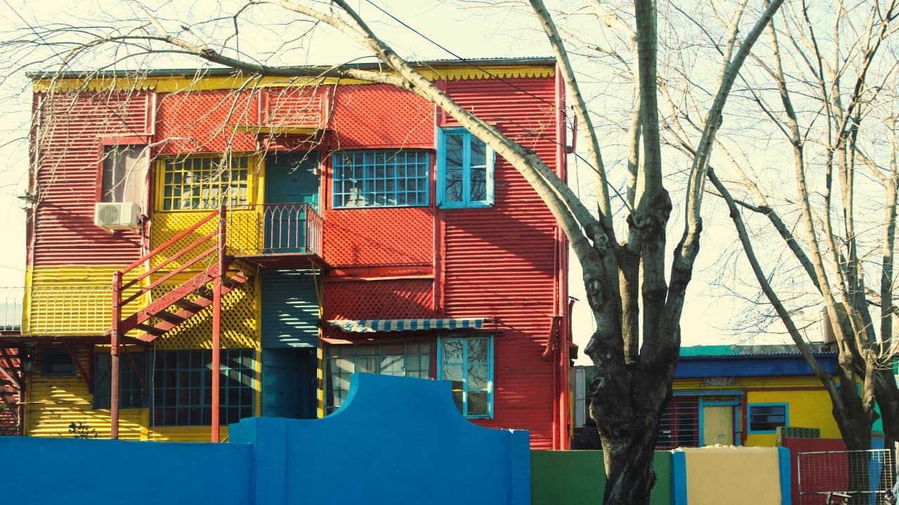 2. La Boca, Buenos Aires, Argentina There’s no place like La Boca for anyone looking for an explosion of color. In this historic district of Buenos Aires, vibrant hues splash across every building, creating an energetic atmosphere that feels alive with music, dance, and culture. The iconic Caminito Street, lined with colorful houses, is a must-see, where every step is a celebration of Argentine vibrancy. (Image: Canva)