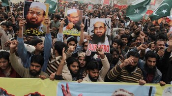 File photo of supporters of Hafiz Saeed, head of Jamaat-ud-Dawa, protesting to condemn his arrest, in Lahore in February 2017.