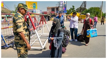 Pakistani nationals arrive at the Integrated Check Post at the Attari-Wagah border to move to their country. (Courtesy: PTI photo)