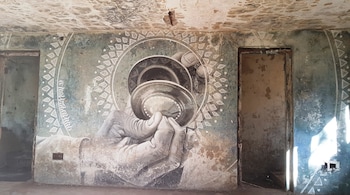 US-based artist Miles Toland's 'Manjira' wall art at Chaurasi Kutia, also known as The Beatles Ashram, in Rishikesh. (Photo by Khursheed Dinshaw)