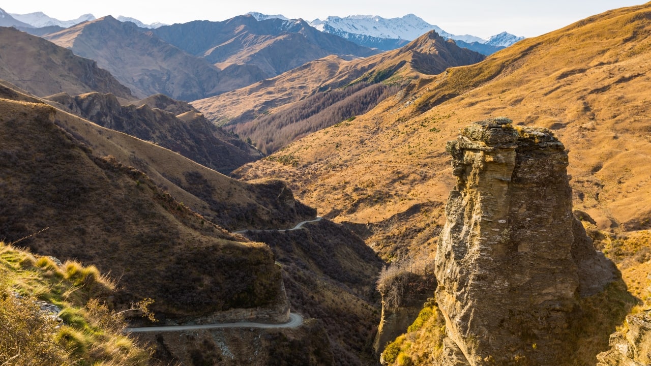 4. Skippers Canyon Road, New Zealand Where: Queenstown Why it’s dangerous: Unpaved, narrow, and built in the 19th century by gold miners, this road has such tight corners that rental car companies often ban it. Highlight: Jaw-dropping river gorges, but don’t take your eyes off the road. (Image: Canva)