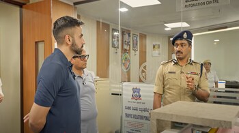 Nikhil Kamath with Bengaluru police commissioner B Dayananda, and (right) traffic police commissioner MN Anucheth. (Image credit: Nikhil Kamath/YouTube)
