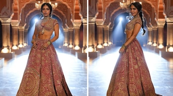 Bhumi sported a short traditional choli paired with a bridal red lehenga. What stood out was the stunning embroidery and mirror work that made the outfit fit her like a dream (Images: @abujanisandeepkhosla/Instagram)