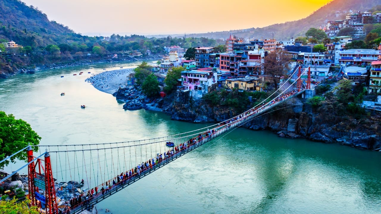 5. Rishikesh, Uttarakhand Located on the serene banks of the Ganges, Rishikesh is known for its yoga retreats, but it’s also an eco-conscious haven for families. Take nature walks, enjoy river activities, and stay in eco-friendly accommodations—this is the perfect spot for a mindful and rejuvenating family trip. (Image: Canva)