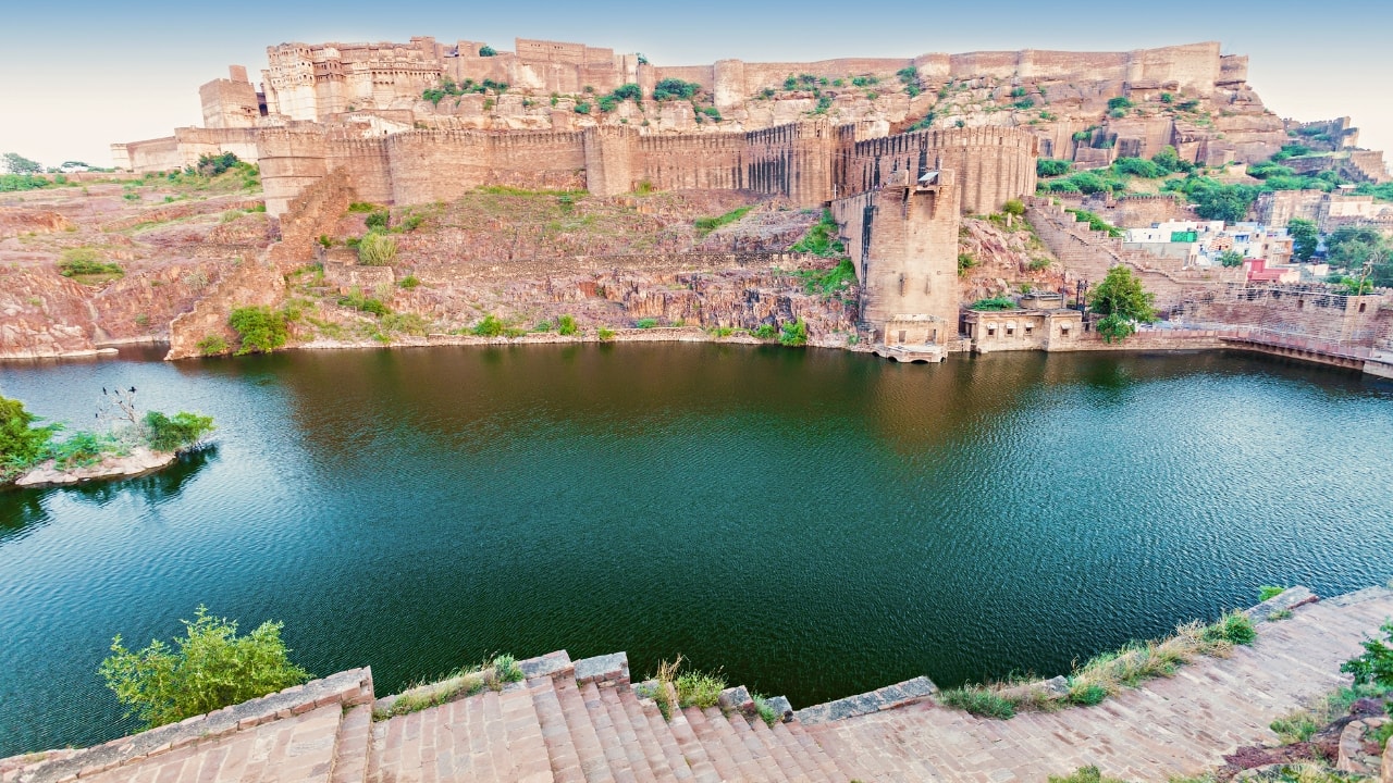 2. Mehrangarh Fort, Rajasthan: The Invincible Crown of the Blue City Commanding the skies above Jodhpur, Mehrangarh was never taken by force. Instead, the British settled for a treaty. Towering walls, hidden gateways, and steep cliffs made direct assault a fool’s errand. Inside, you’ll find a treasure trove of palaces, museums, and echoes of royal life that once pulsed through these courtyards. This isn’t just a fort—it’s a masterpiece of Rajput pride and engineering. (Image: Canva) 2. Mehrangarh Fort, Rajasthan: The Invincible Crown of the Blue City Commanding the skies above Jodhpur, Mehrangarh was never taken by force. Instead, the British settled for a treaty. Towering walls, hidden gateways, and steep cliffs made direct assault a fool’s errand. Inside, you’ll find a treasure trove of palaces, museums, and echoes of royal life that once pulsed through these courtyards. This isn’t just a fort—it’s a masterpiece of Rajput pride and engineering. (Image: Canva)