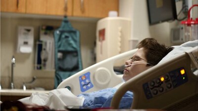 What are the tax implications of receiving money for hospital expenses in India?