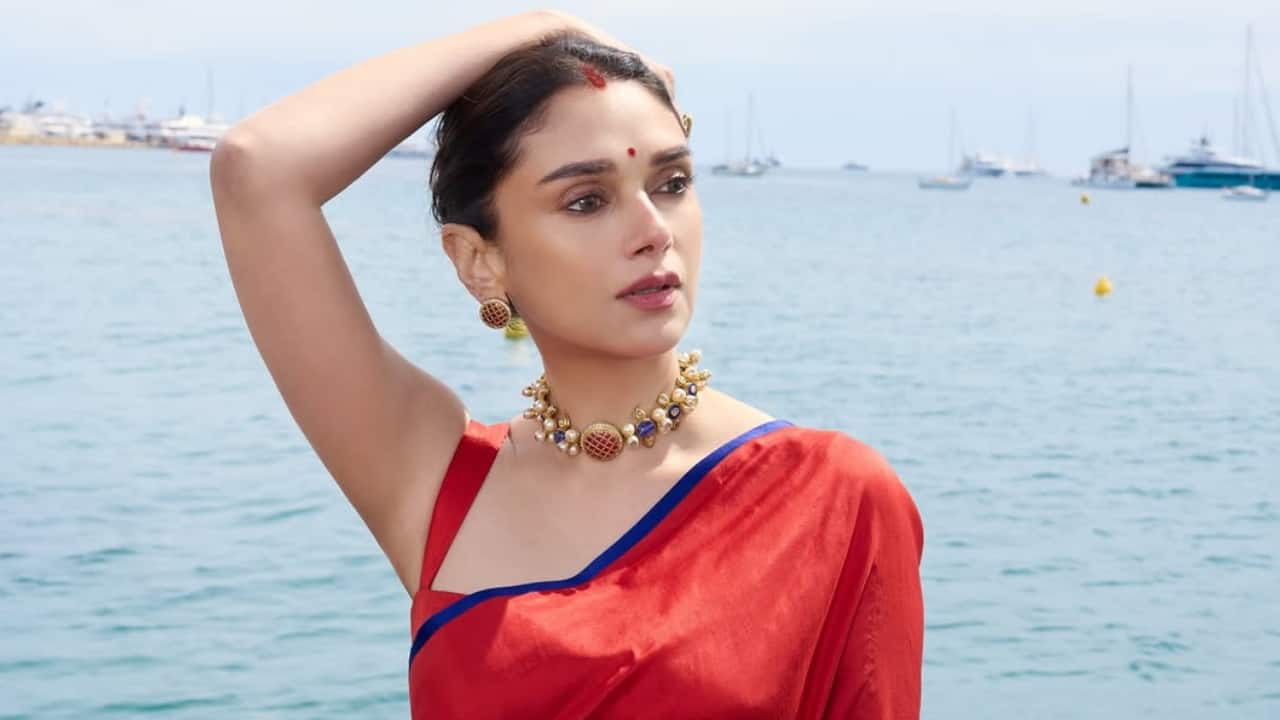 Aditi Rao Hydari in a red saree at Cannes 2025