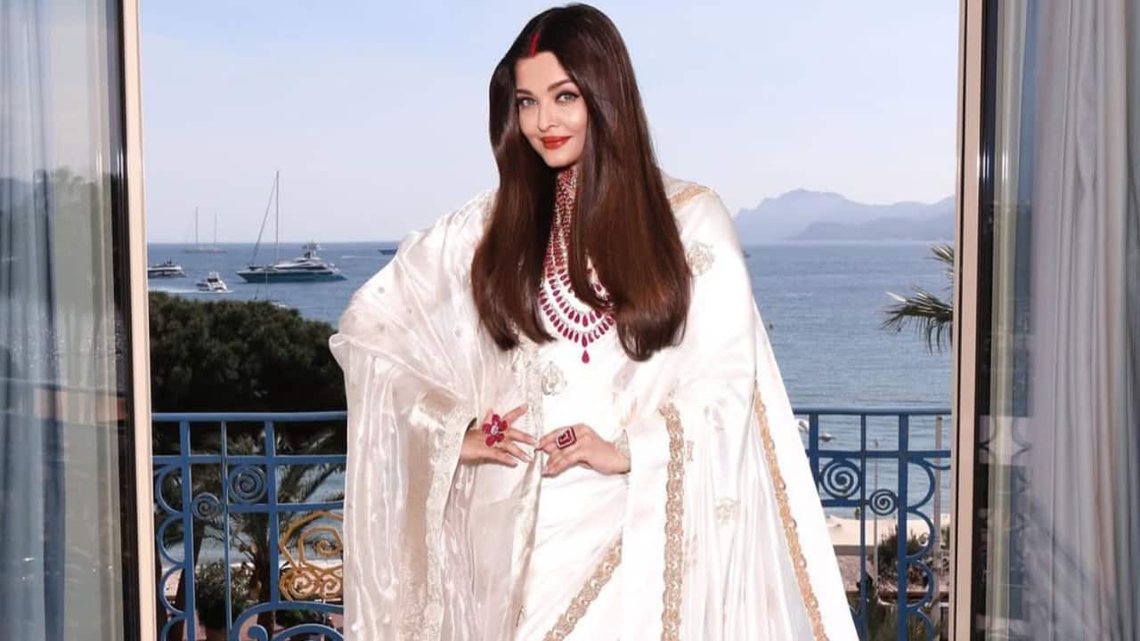 Aishwarya Rai Bachchan shares pics in Ivory saree featuring real gold and silver zardozi embroidery and sporting sindoor at Cannes 2025