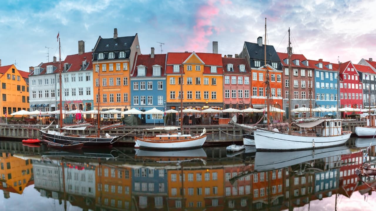 6. Denmark – A Detail-Driven Process (23.7% Rejection Rate) Known for hygge and scenic coastlines, Denmark also comes with a detailed visa process. Over 31,000 applications didn’t make it through. (Image: Canva)