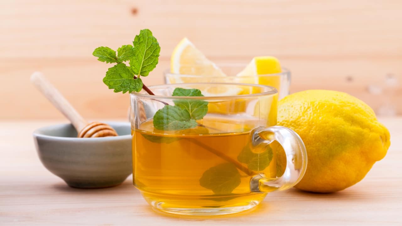 Honey lemon mint tea: It is a soothing choice, perfect for calming sore throats and aiding digestion while also refreshing your senses with minty coolness (Image: Canva)
