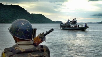 An Indian paramilitary soldier patrols the Brahmaputra river near Guwahati (File Photo)