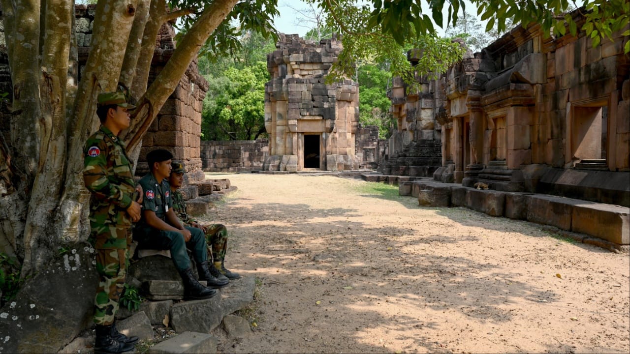 Cambodian soldiers guard the disputed ancient Khmer temple Prasat Ta Muen Thom, or Prasat Ta Moan Thom in Khmer, on the Cambodian-Thai border in Oddar Meanchey province on March 26. (Image credit: AFP)