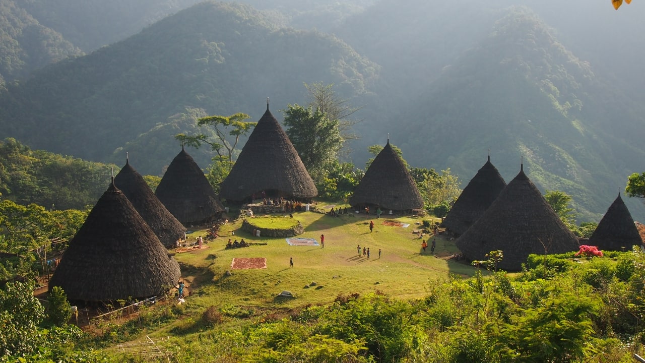 1. Wae Rebo, Flores High in the mist-wrapped highlands of Flores lies Wae Rebo — a centuries-old Manggarai village with iconic conical huts, deep ancestral roots, and a soul-soothing stillness only reached by trek. (Image: Canva)