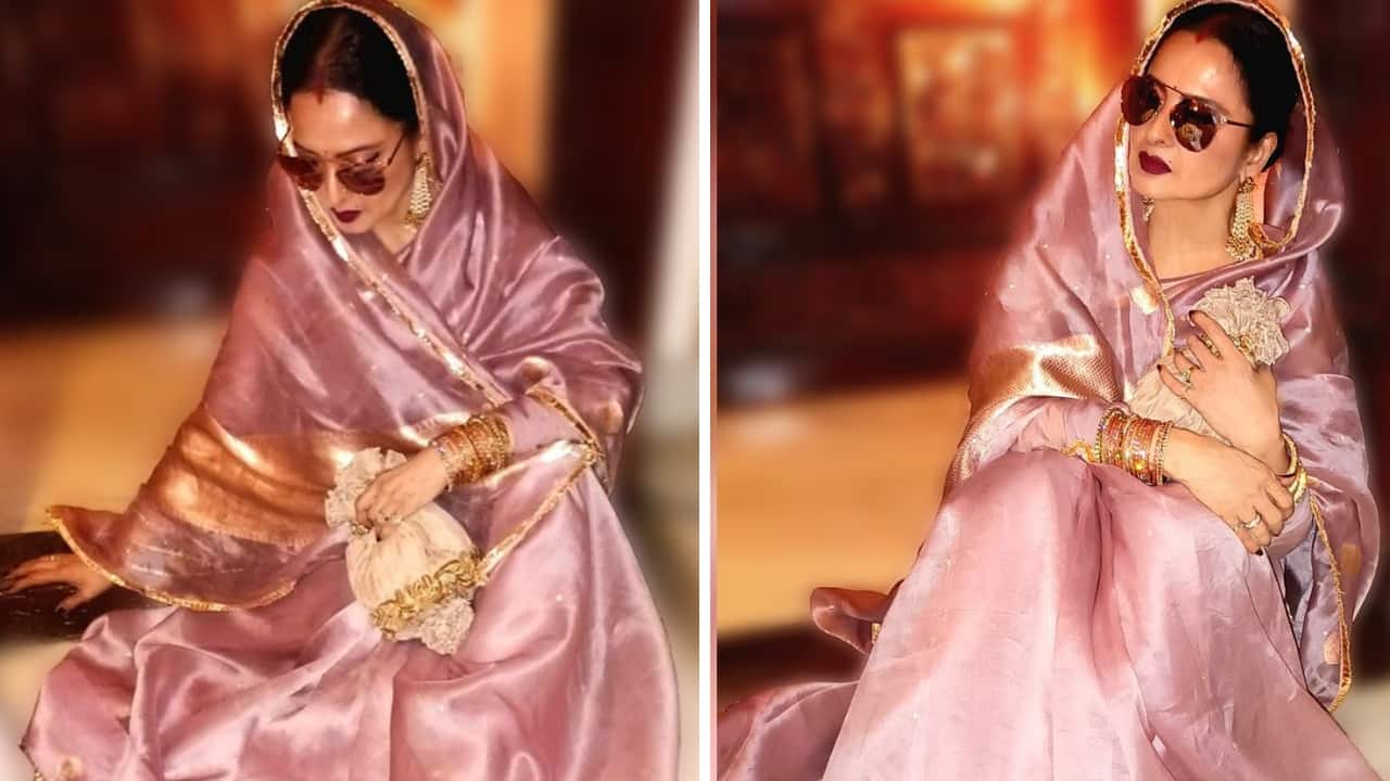 Rekha proves she’s a timeless beauty in an onion pink saree with lotus motifs