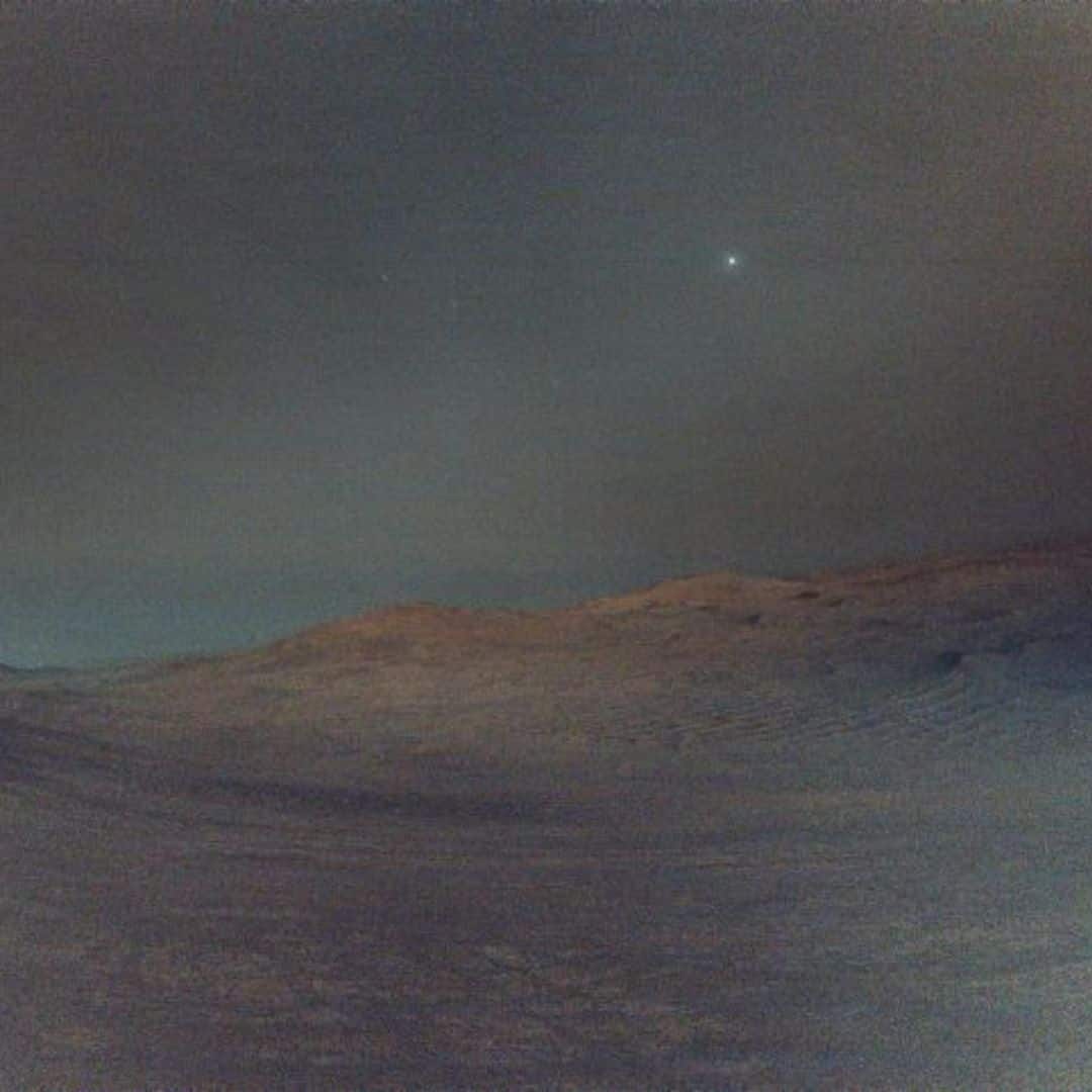 Deimos sparkles softly in a sky brushed with pre-dawn lilacs and mauves. (Image: NASA)