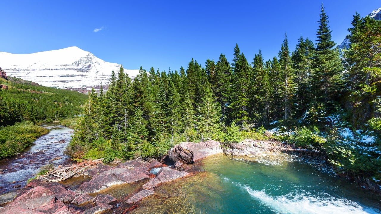 6. Glacier National Park, Montana, USA Once known as the “Crown of the Continent,” Glacier National Park is losing its glaciers at an alarming rate due to global warming. Hike its rugged trails and marvel at its pristine lakes now—future generations may only see it in photos. (Image: Canva)