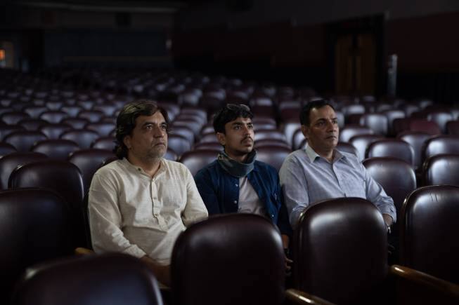 (From left) Swanand Kirkire, Adarsh Gourav and Shubhrajyoti Barat in a still from Varun Grover's film 'Kiss'.