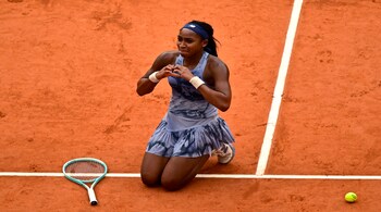 US Coco Gauff celebrates after winning her women's singles final match against Belarus' Aryna Sabalenka on day 14 of the French Open tennis tournament on Court Philippe-Chatrier at the Roland-Garros Complex in Paris 