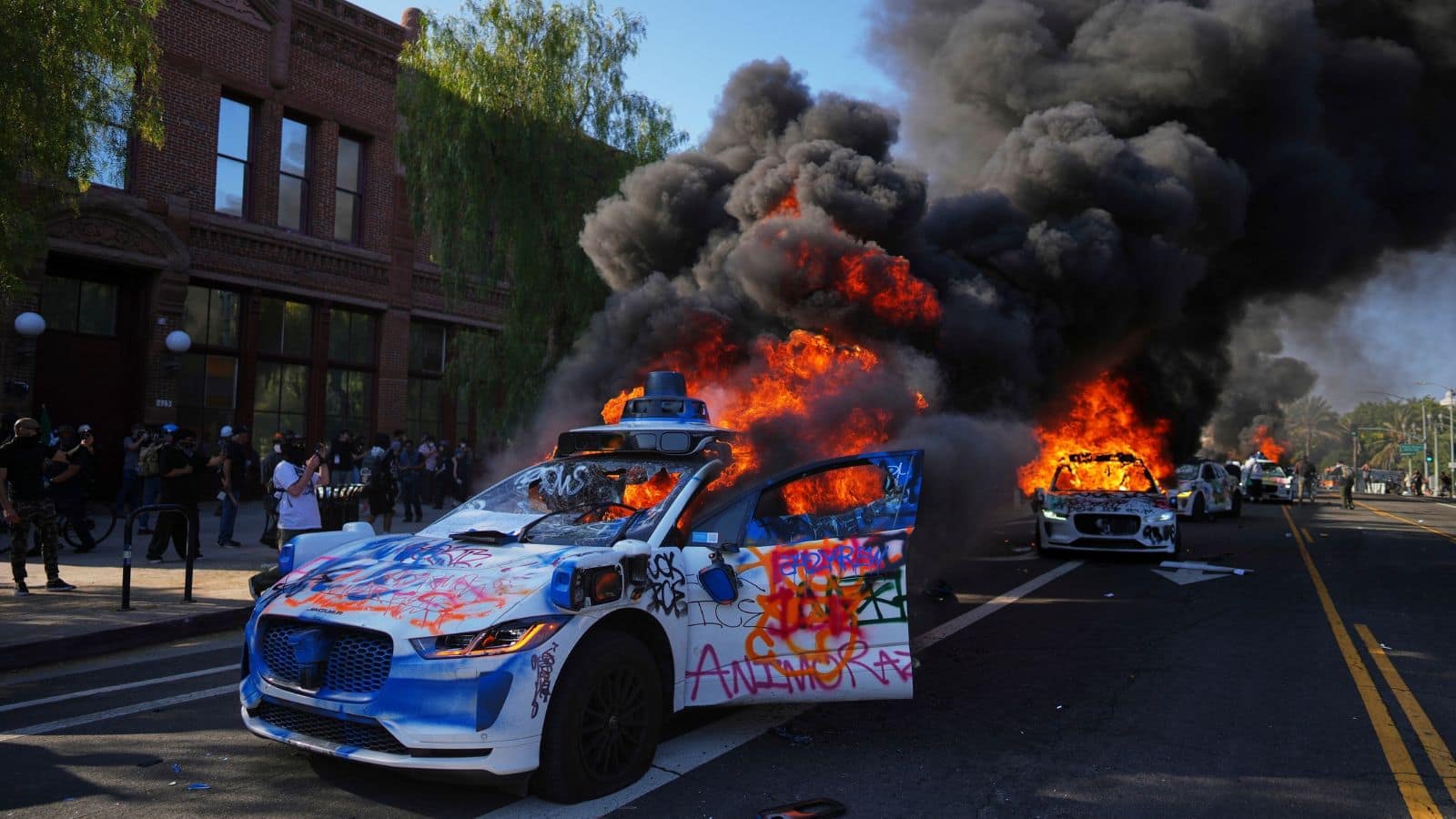 Google Waymo cars are being set on fire by protestors in LA: Here’s why