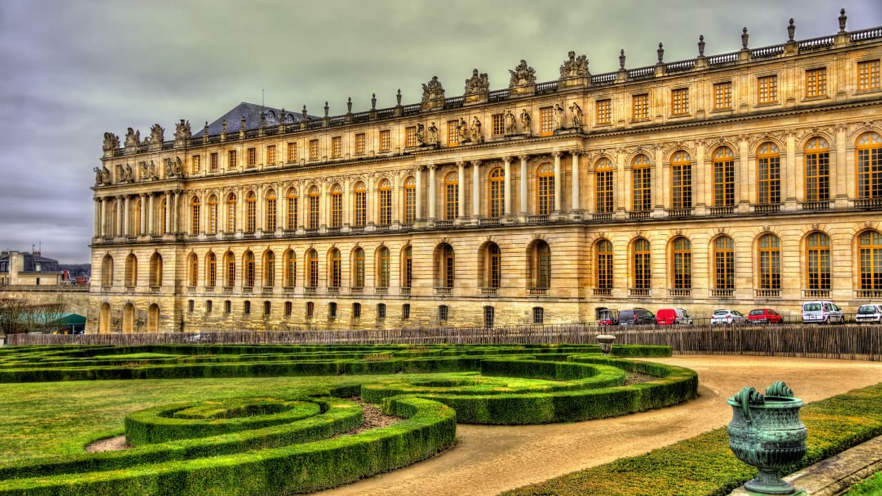 11. Palace of Versailles, France Once the seat of French royalty, Versailles is grandeur personified. With its Hall of Mirrors, ornate gardens, and gilded halls, this château remains a symbol of absolute monarchy — and the excesses that fueled the French Revolution. (Image: Canva)