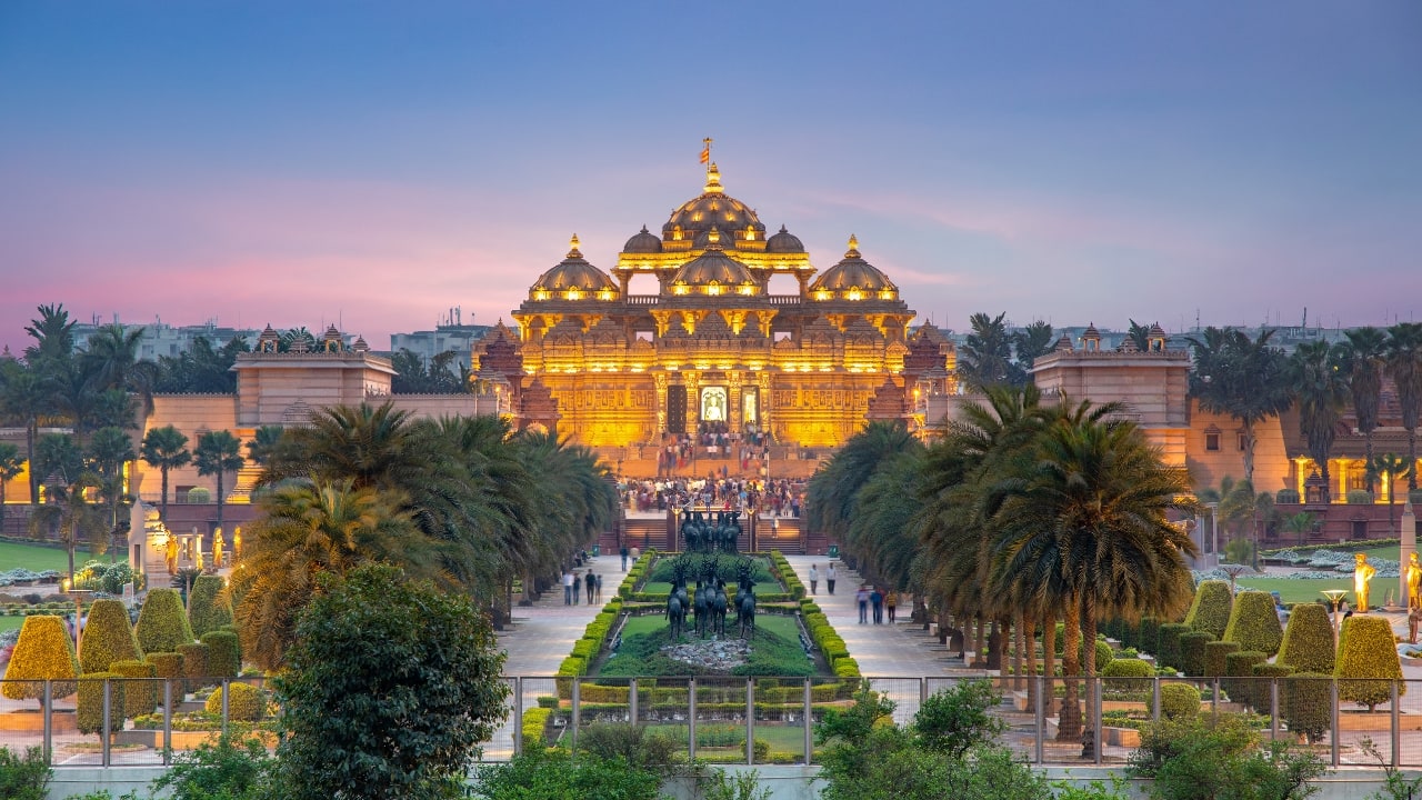 7. Akshardham – Culture with a Touch of Awe More than a temple, Akshardham is an experience. From its intricate carvings and vast gardens to a cultural boat ride and a spectacular musical fountain show, it’s a day out that blends tradition with entertainment. (Image: Canva)
