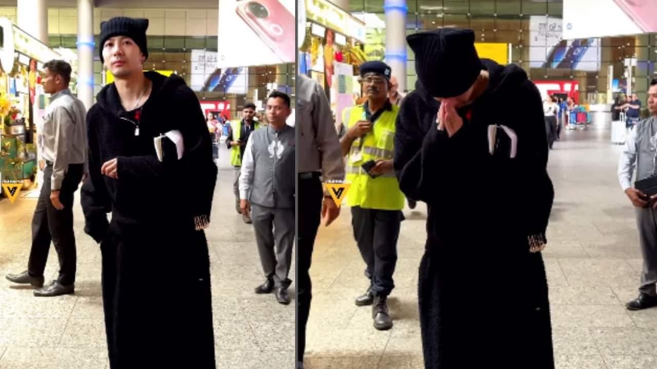 K Pop singer Jackson Wang greets with a namaste as he arrives in India for extended visit