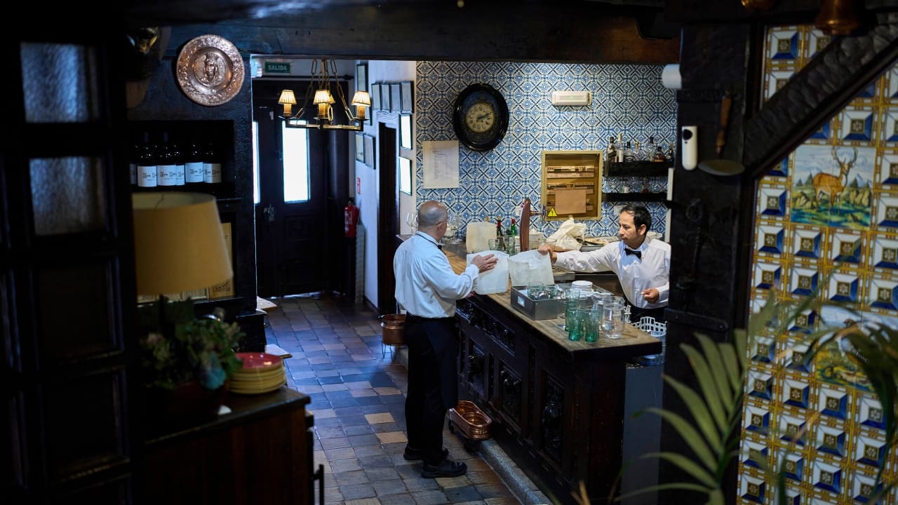 Waiters work at Casa Pedro restaurant in Madrid, Spain, on May 16, 2025. (AP Photo/Manu Fernandez)