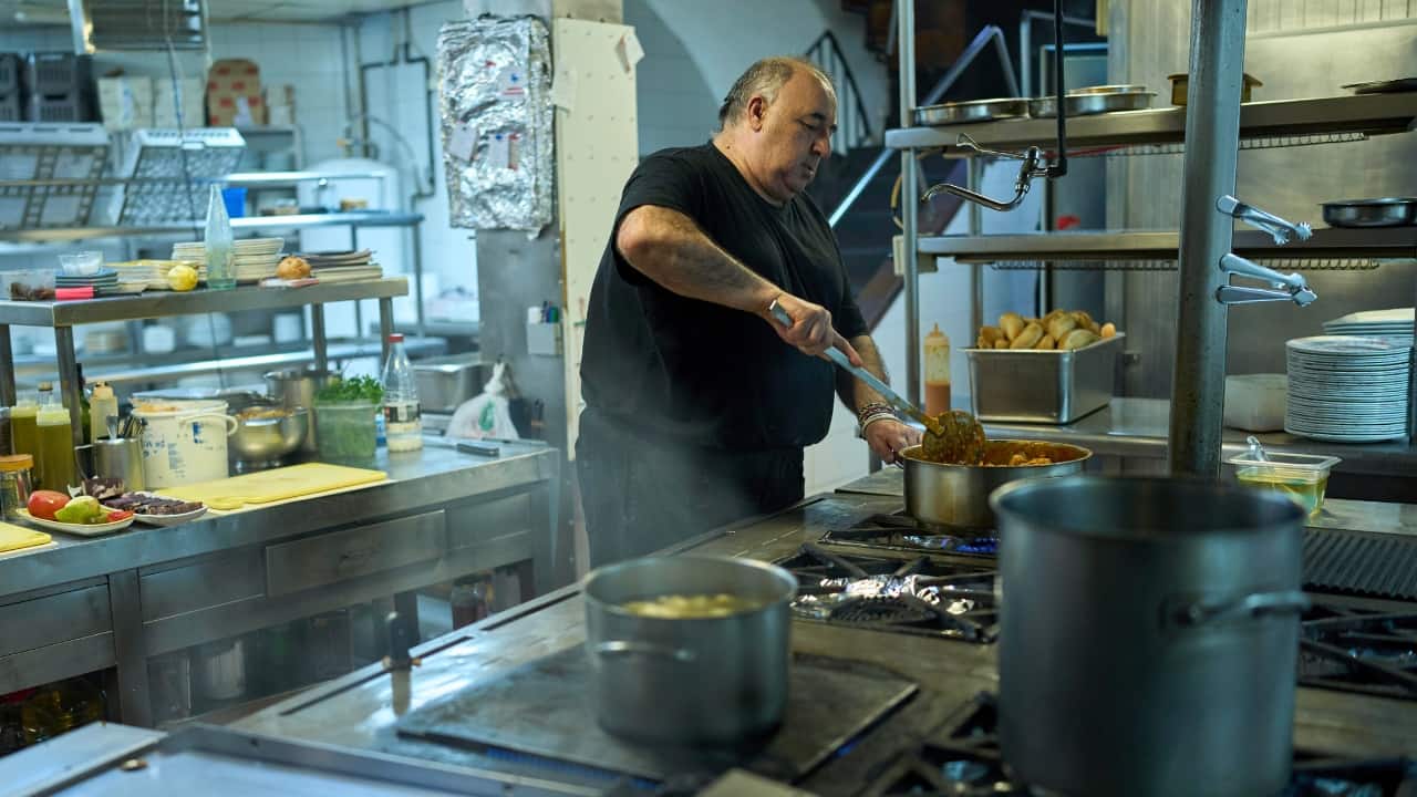 A chef cooks at Casa Pedro restaurant in Madrid, Spain, on May 16, 2025. (AP Photo/Manu Fernandez)