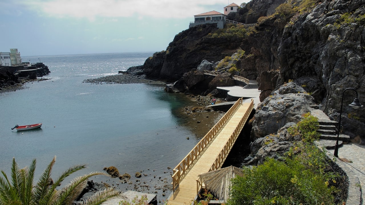 7. El Hierro, Spain – The Canary Island Time Forgot El Hierro is everything the other Canary Islands are not—uncrowded, eco-conscious, and untouched by mass tourism. With its rugged cliffs, lava fields, and winding hiking trails, this little island feels like another world. Whether you’re diving in marine reserves or stargazing in complete silence, El Hierro is as raw and real as it gets. (Image: Canva) 7. El Hierro, Spain – The Canary Island Time Forgot El Hierro is everything the other Canary Islands are not—uncrowded, eco-conscious, and untouched by mass tourism. With its rugged cliffs, lava fields, and winding hiking trails, this little island feels like another world. Whether you’re diving in marine reserves or stargazing in complete silence, El Hierro is as raw and real as it gets. (Image: Canva)