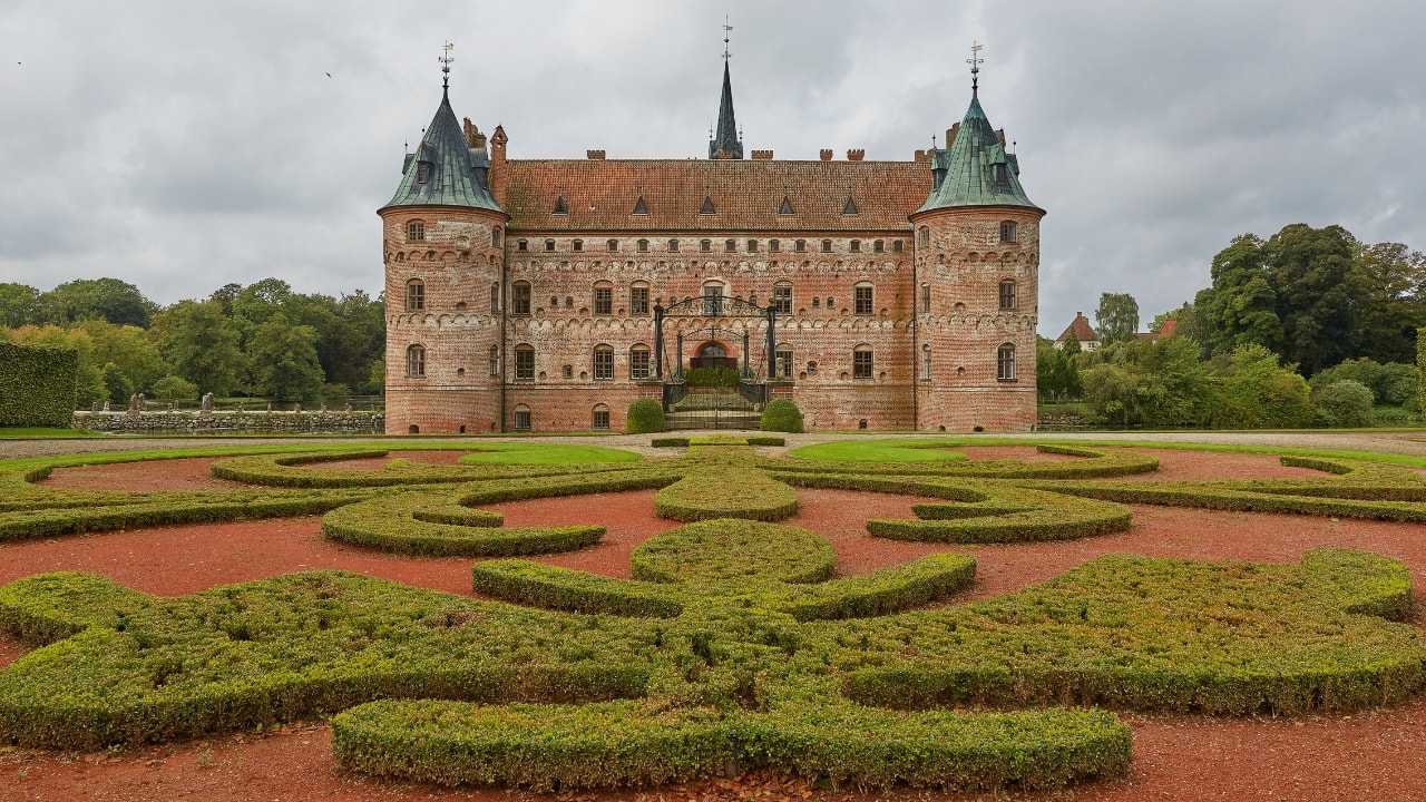 8. Funen, Denmark – A Fairytale Island with Room to Breathe The birthplace of Hans Christian Andersen, Funen (or Fyn) is Denmark’s answer to rural charm. Rolling countryside, thatched-roof cottages, and storybook towns like Odense make it perfect for a romantic road trip. With more fields than ferries and more castles than cafés, Funen invites you to slow down and step into a simpler time. (Image: Canva) 8. Funen, Denmark – A Fairytale Island with Room to Breathe The birthplace of Hans Christian Andersen, Funen (or Fyn) is Denmark’s answer to rural charm. Rolling countryside, thatched-roof cottages, and storybook towns like Odense make it perfect for a romantic road trip. With more fields than ferries and more castles than cafés, Funen invites you to slow down and step into a simpler time. (Image: Canva)