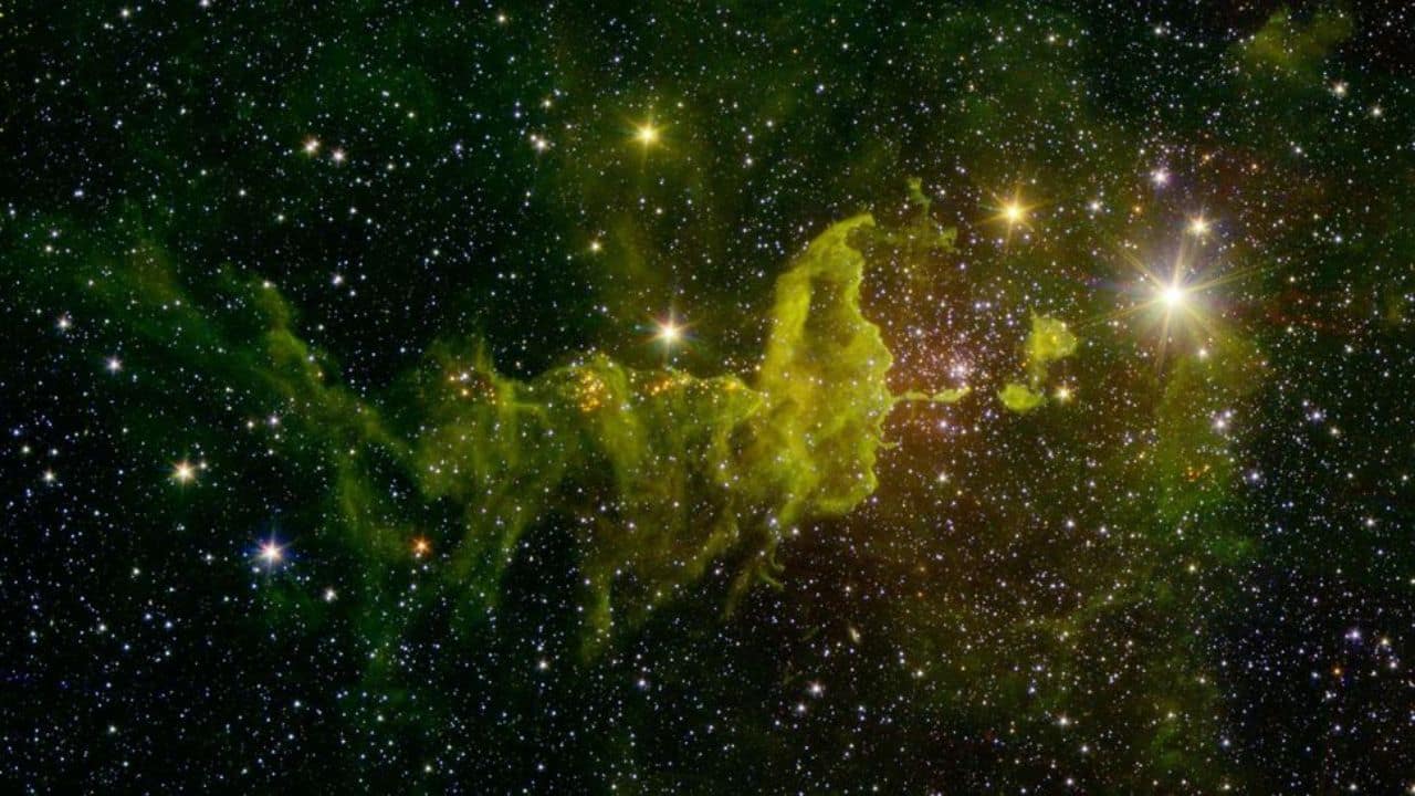 Spider Nebula: Also located in the Milky Way, the Spider Nebula is a vibrant star-forming region marked by its striking green tendrils. (Image: NASA)