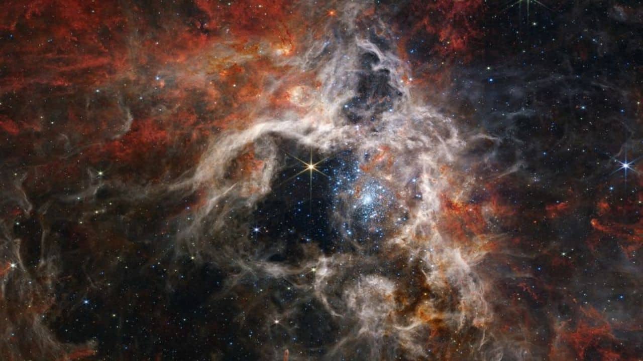 Tarantula Nebula: Also called 30 Doradus, the Tarantula Nebula is the biggest and brightest star-forming region in the Local Group, which includes the Milky Way, Andromeda and about 20 smaller galaxies. (Image: NASA)