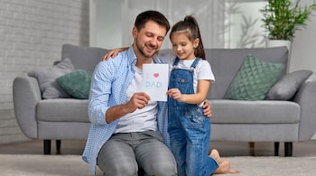 Father's Day 2025: From being the one who held your finger to being your forever fixer and cheerleader, here are 30 heartfelt wishes that go beyond clichés to celebrate dads for who they truly are (Image: Canva)