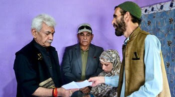 J&K L-G hands over job letter to wife of pony ride operator killed in Pahalgam terror attack