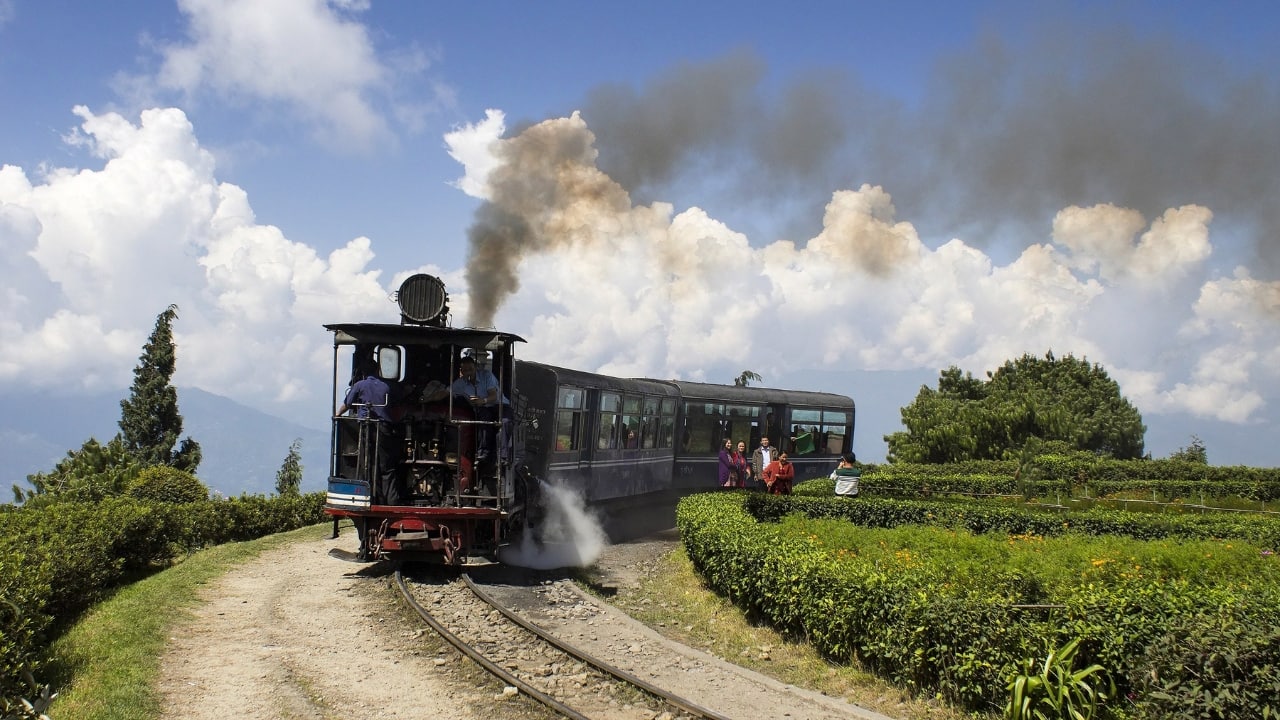 8. Darjeeling, West Bengal With rain-kissed tea gardens and low-hanging clouds over the Kanchenjunga range, Darjeeling turns into a misty, moody escape in July. Solo travelers will love its old-world charm, scenic walks, steaming momos, and heritage stays. The hill station is also known for its welcoming locals and safe environment, making it ideal for solo women travelers as well. 8. Darjeeling, West Bengal With rain-kissed tea gardens and low-hanging clouds over the Kanchenjunga range, Darjeeling turns into a misty, moody escape in July. Solo travelers will love its old-world charm, scenic walks, steaming momos, and heritage stays. The hill station is also known for its welcoming locals and safe environment, making it ideal for solo women travelers as well.