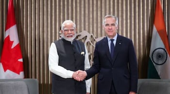 Prime Minister Narendra Modi with his Canadian counterpart Mark Carney