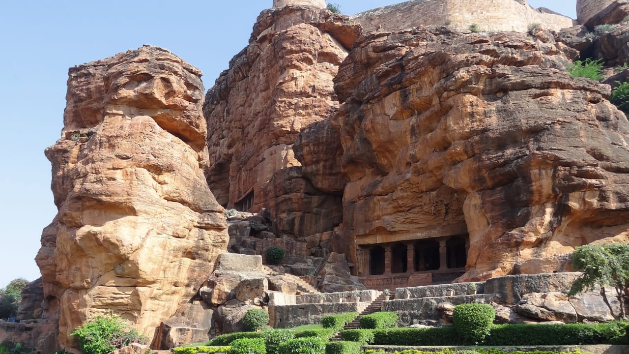 Badami Cave Temples, Karnataka: A group of four majestic rock-cut temples built in the 6th century, showcasing Badami Chalukya architecture and Hindu deities. (image: canva) Badami Cave Temples, Karnataka: A group of four majestic rock-cut temples built in the 6th century, showcasing Badami Chalukya architecture and Hindu deities. (image: canva)