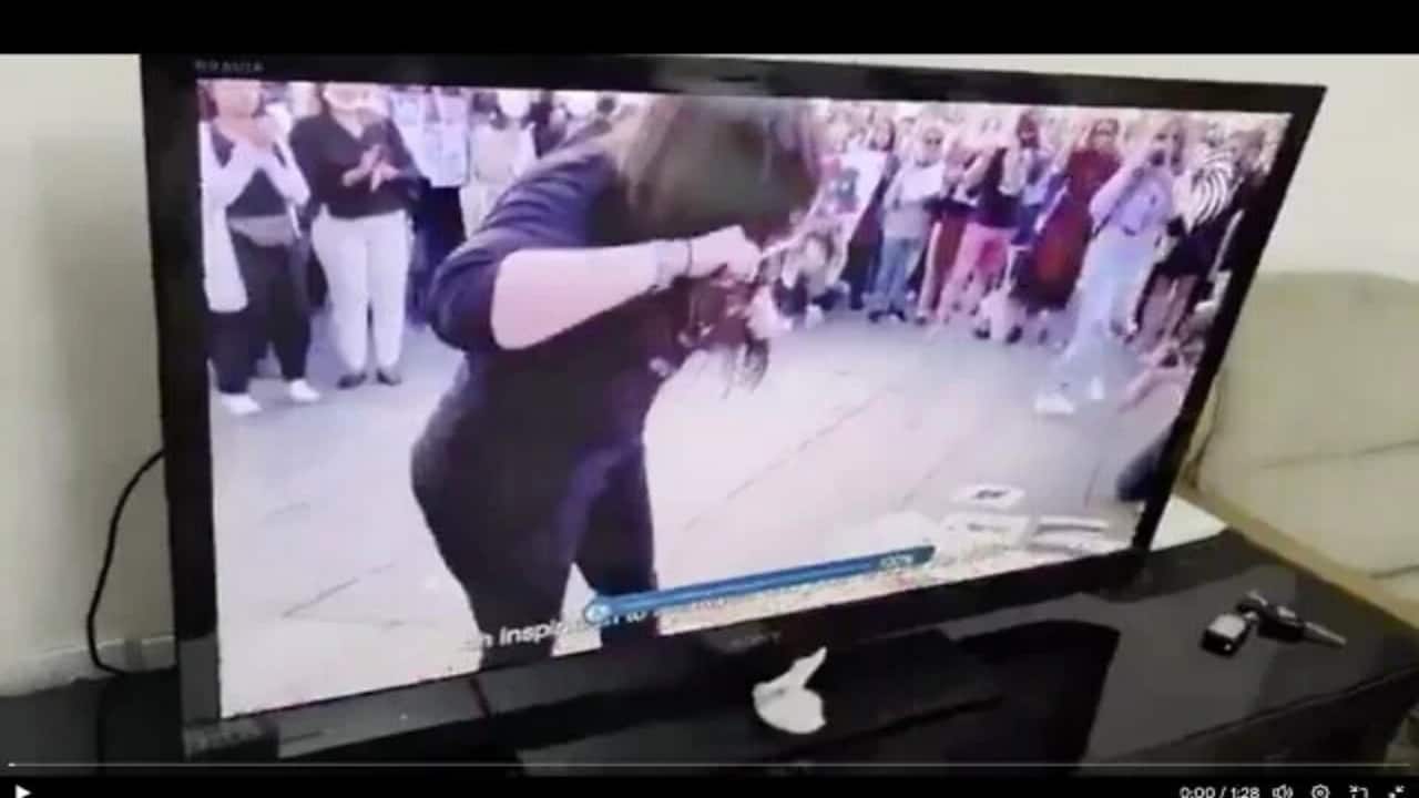 Iran blames Israel for hacking state TV; street protest messages, hair cutting visuals aired