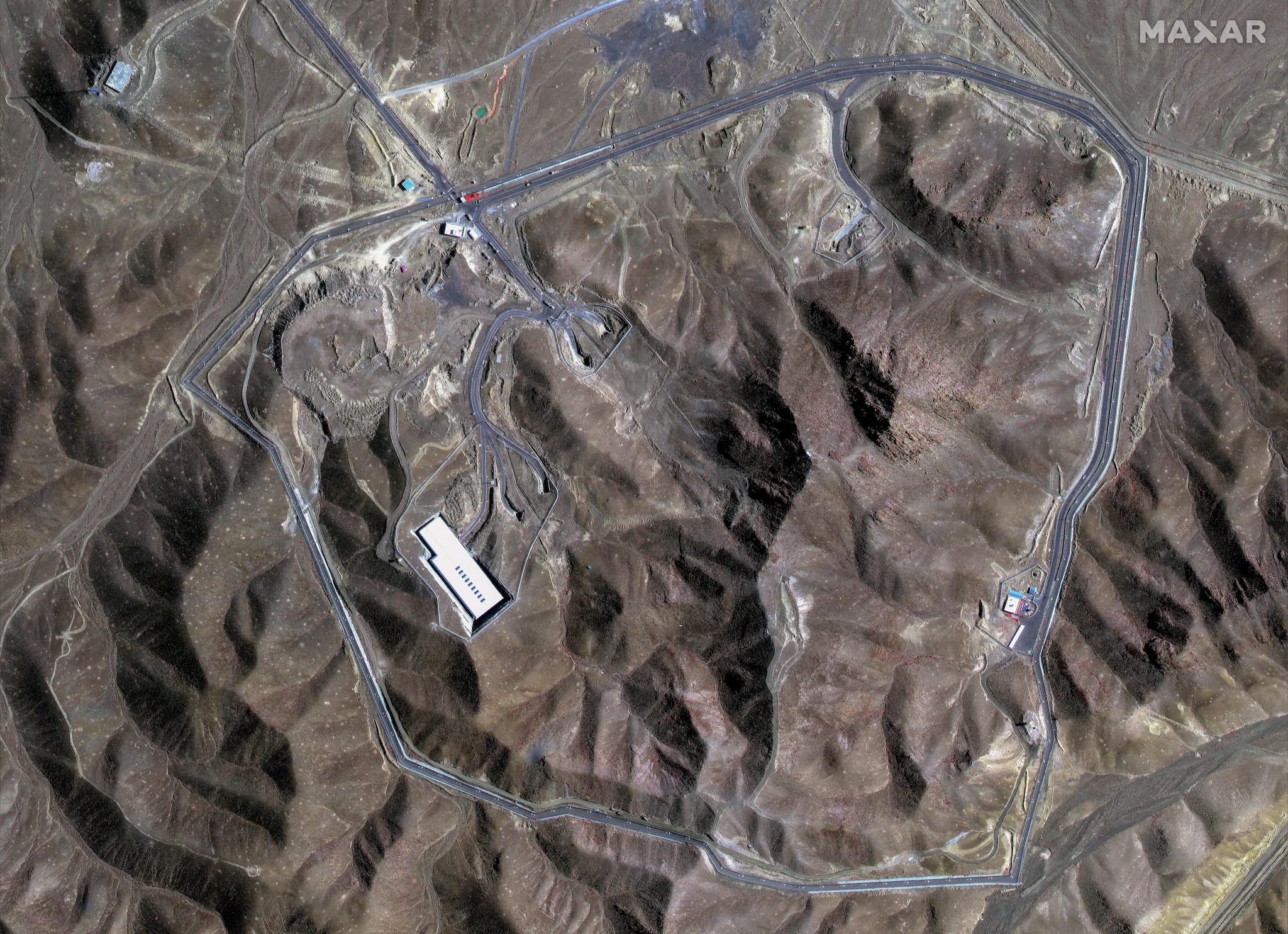 satellite picture provided by Maxar Technologies and taken on June 19, 2025, shows Iran's Fordow Fuel Enrichment Plant (FFEP) (Image: AFP) 