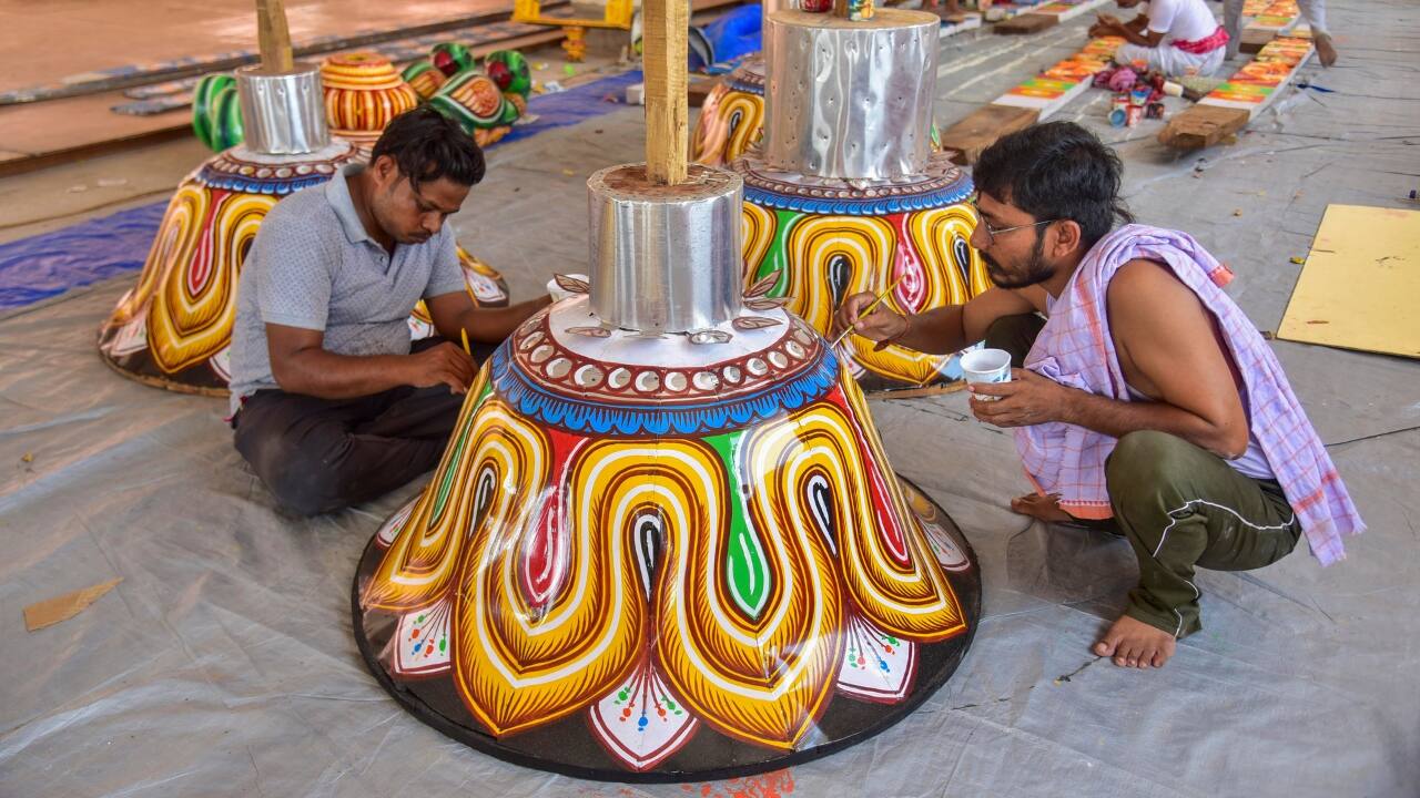 Vibrant arrangements and rituals underway, setting the stage for the sacred Puri Rath Yatra festival. (Image: PTI)