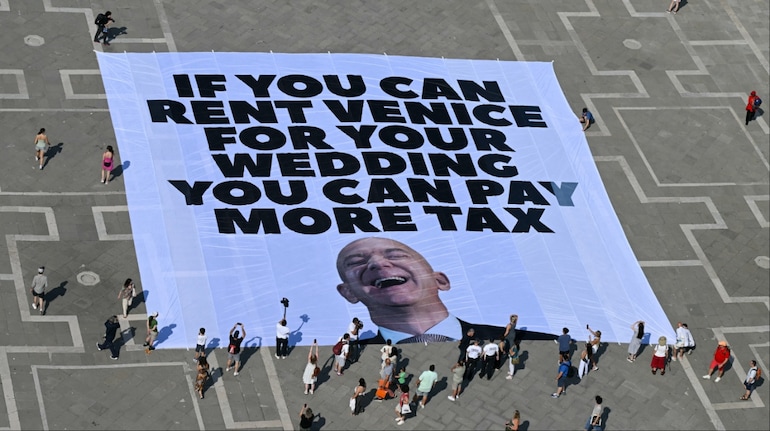 Jeff Bezos wedding: Why Venice is protesting with 'pay more tax' and 'no space' banners. Watch